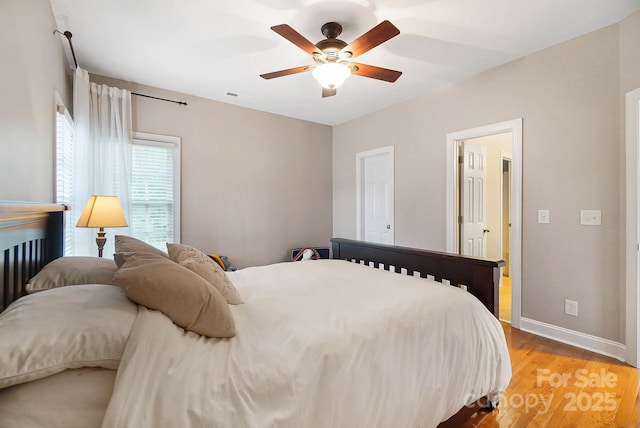 16532 Flintrock Falls Ln, Charlotte, NC 28278 - bedroom featuring visible vents, light wood finished floors, baseboards, and ceiling fan