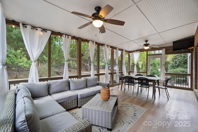 16532 Flintrock Falls Ln, Charlotte, NC 28278 - sunroom with outdoor dining space, a ceiling fan, and an outdoor living space