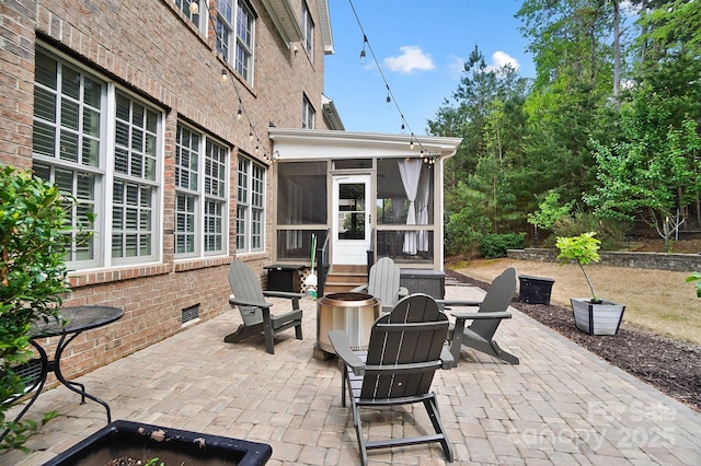16532 Flintrock Falls Ln, Charlotte, NC 28278 - view of patio / terrace with a sunroom and an outdoor fire pit