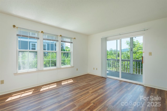 3101 Idle Hour Dr, Asheville, NC 28806 - empty room featuring wood finished floors and baseboards