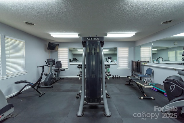 3101 Idle Hour Dr, Asheville, NC 28806 - exercise room with a textured ceiling