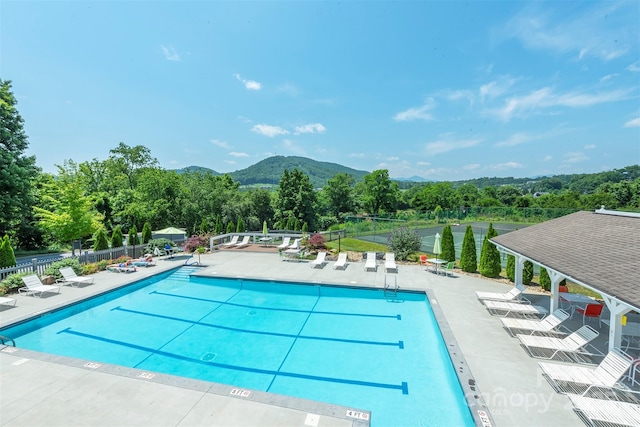 3101 Idle Hour Dr, Asheville, NC 28806 - community pool featuring a mountain view and a patio area