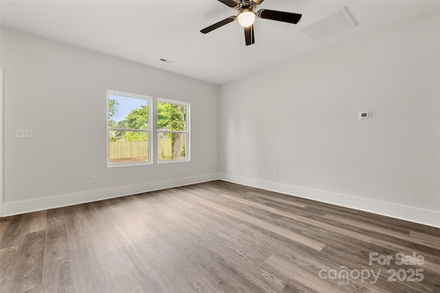 508 Clegg St, Shelby, NC 28150 - empty room with baseboards, a ceiling fan, visible vents, and wood finished floors