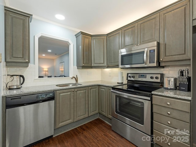 8251 Tradd Ct, Charlotte, NC 28210 - kitchen featuring stainless steel appliances, a sink, ornamental molding, and decorative backsplash