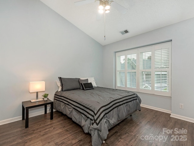 8251 Tradd Ct, Charlotte, NC 28210 - bedroom featuring vaulted ceiling, dark wood finished floors, baseboards, and a ceiling fan