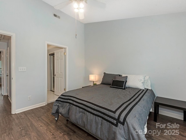8251 Tradd Ct, Charlotte, NC 28210 - bedroom with wood finished floors, baseboards, a ceiling fan, and a high ceiling
