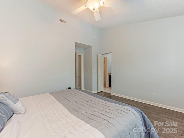 8251 Tradd Ct, Charlotte, NC 28210 - bedroom featuring wood finished floors, baseboards, a towering ceiling, and ceiling fan