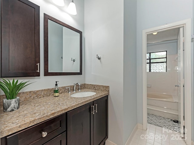 8251 Tradd Ct, Charlotte, NC 28210 - full bath with vanity, tile patterned floors, baseboards, and shower / bathtub combination