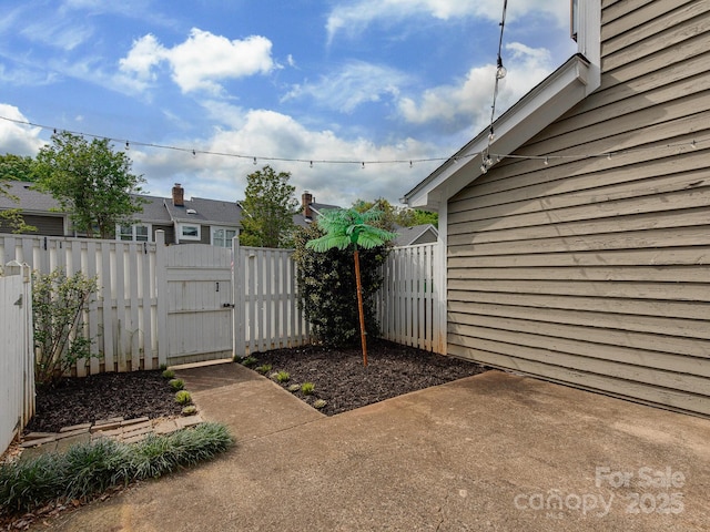 8251 Tradd Ct, Charlotte, NC 28210 - view of patio / terrace with a gate