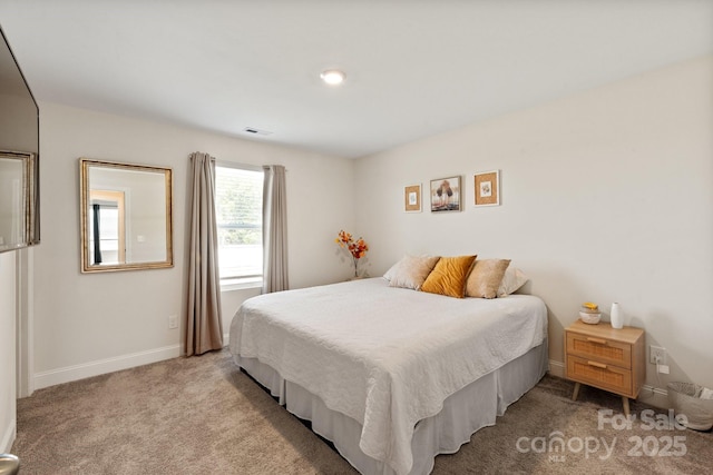 bedroom featuring visible vents, carpet, and baseboards