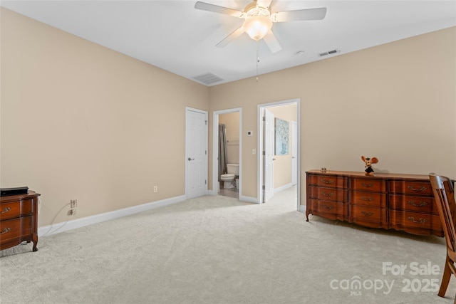 bedroom featuring connected bathroom, carpet floors, visible vents, and baseboards