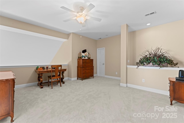 living area with vaulted ceiling, visible vents, carpet floors, baseboards, and ceiling fan