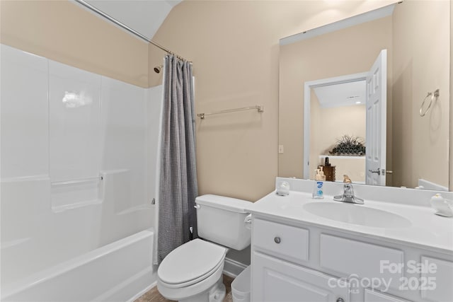 full bathroom featuring shower / bath combo, toilet, and vanity