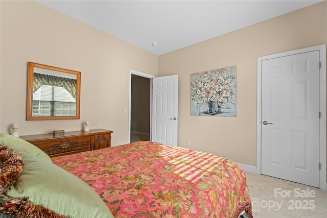 bedroom with light carpet