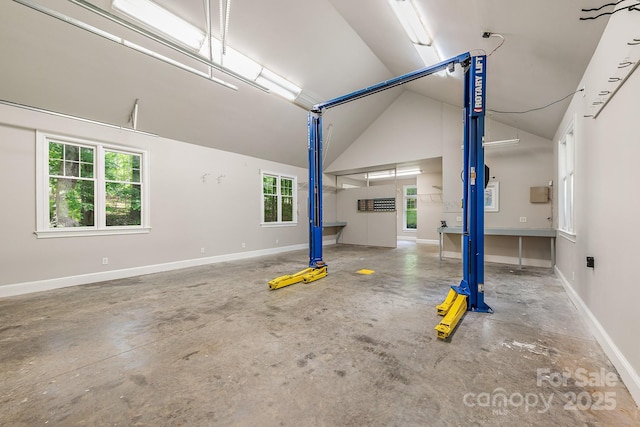 garage featuring baseboards