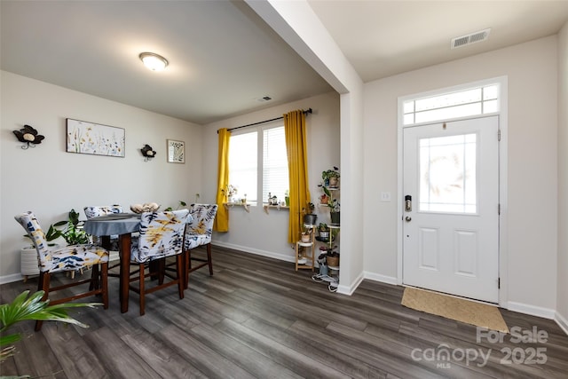3100 Cheyney Park Dr, Charlotte, NC 28269 - entryway featuring visible vents, baseboards, and dark wood finished floors
