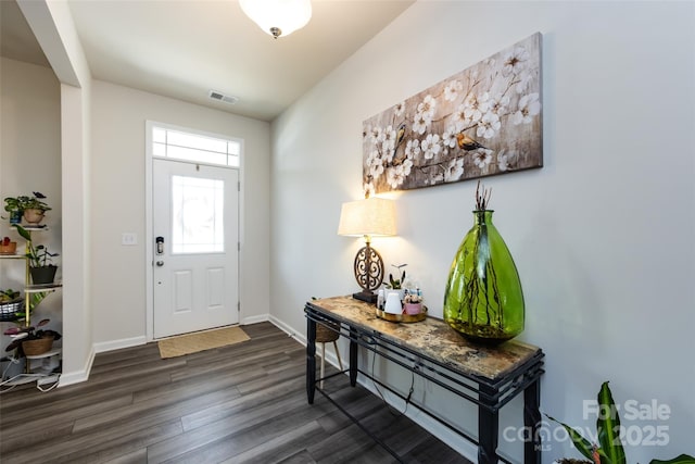 3100 Cheyney Park Dr, Charlotte, NC 28269 - entryway with dark wood-style flooring, visible vents, and baseboards
