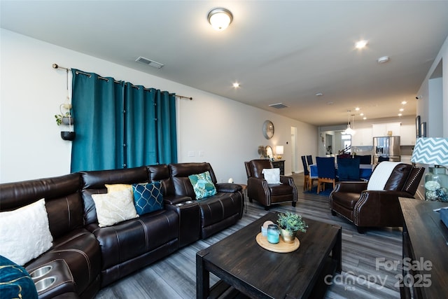 3100 Cheyney Park Dr, Charlotte, NC 28269 - living area featuring recessed lighting, visible vents, and wood finished floors
