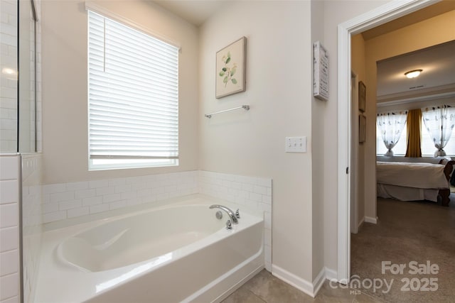 3100 Cheyney Park Dr, Charlotte, NC 28269 - ensuite bathroom with baseboards, a garden tub, and connected bathroom