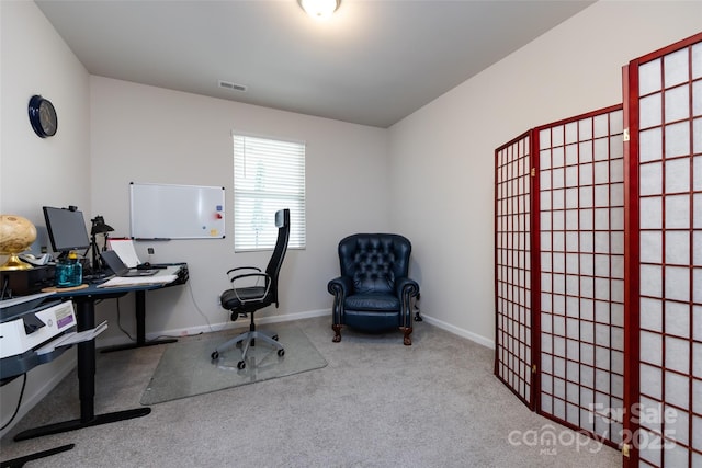 3100 Cheyney Park Dr, Charlotte, NC 28269 - carpeted home office with visible vents and baseboards