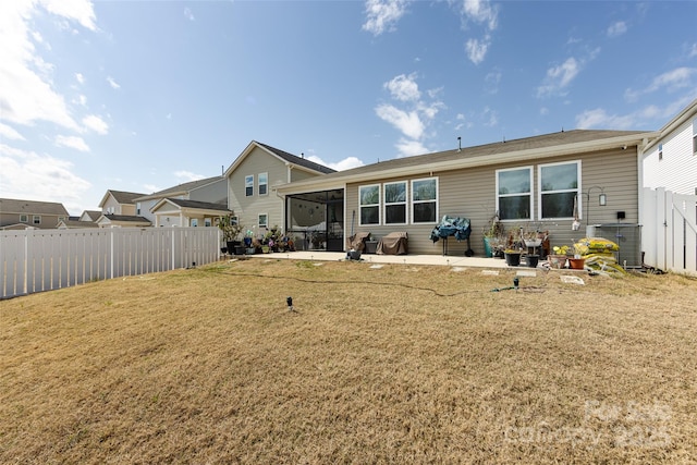 3100 Cheyney Park Dr, Charlotte, NC 28269 - rear view of house with a patio area, a fenced backyard, and a lawn