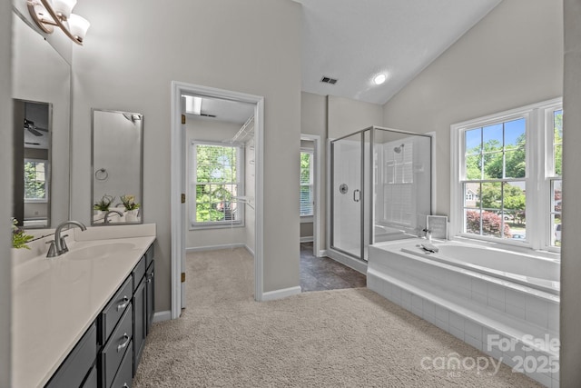 9000 Stourbridge Dr, Huntersville, NC 28078 - bathroom with a bath, visible vents, a stall shower, vanity, and high vaulted ceiling