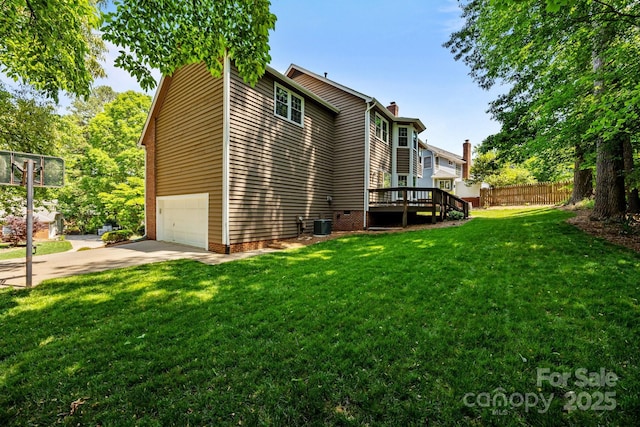 9000 Stourbridge Dr, Huntersville, NC 28078 - view of side of property featuring a garage, fence, a chimney, a lawn, and driveway