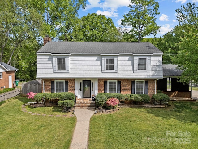 6035 Idlebrook Dr, Charlotte, NC 28212 - view of front facade featuring brick siding and a chimney