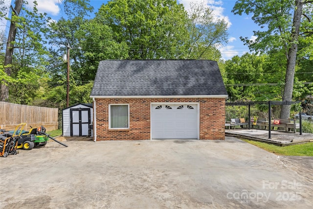 6035 Idlebrook Dr, Charlotte, NC 28212 - garage with a storage unit and driveway