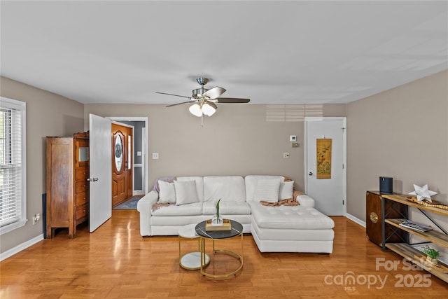 6035 Idlebrook Dr, Charlotte, NC 28212 - living area featuring light wood-type flooring and a ceiling fan
