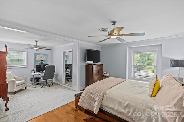 6035 Idlebrook Dr, Charlotte, NC 28212 - bedroom featuring an office area, crown molding, light wood finished floors, and ceiling fan