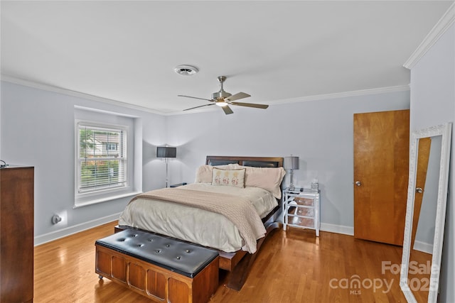 6035 Idlebrook Dr, Charlotte, NC 28212 - bedroom with crown molding, wood finished floors, and a ceiling fan