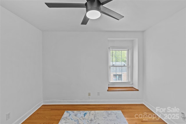 6035 Idlebrook Dr, Charlotte, NC 28212 - empty room with wood finished floors and ceiling fan