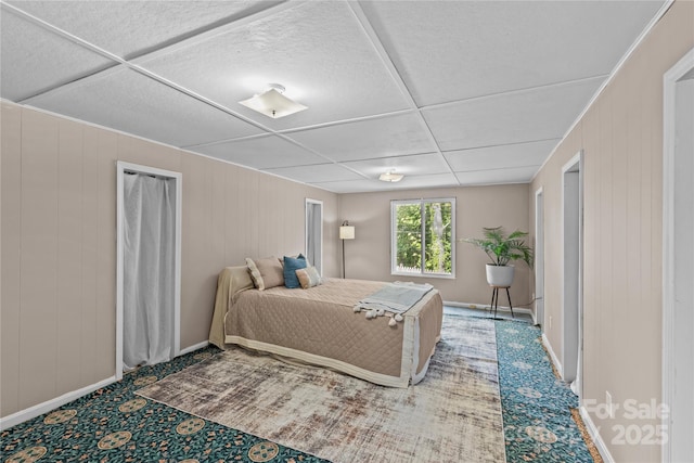 6035 Idlebrook Dr, Charlotte, NC 28212 - bedroom with carpet and wooden walls