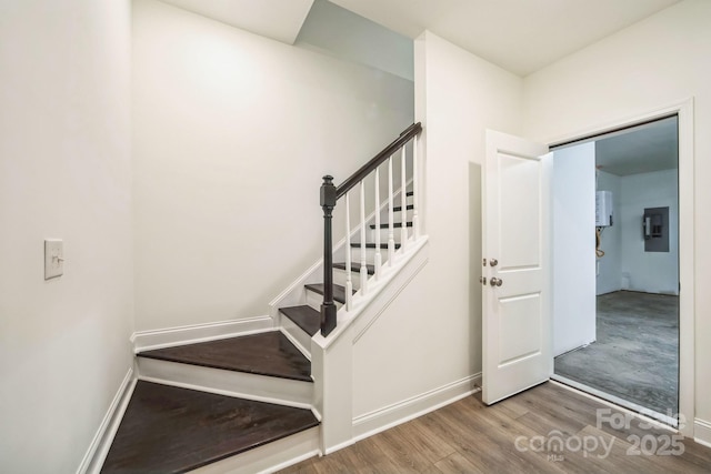 81 Walnut Springs Dr Unit 22-D, Asheville, NC 28804 - stairs featuring wood finished floors, baseboards, and electric panel