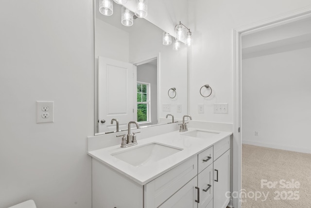 184 Cherry Springs Ln Unit 1-B, Asheville, NC 28804 - full bath featuring a sink, baseboards, and double vanity