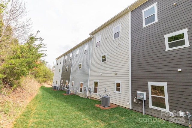 184 Cherry Springs Ln Unit 1-B, Asheville, NC 28804 - back of house featuring a yard and central AC