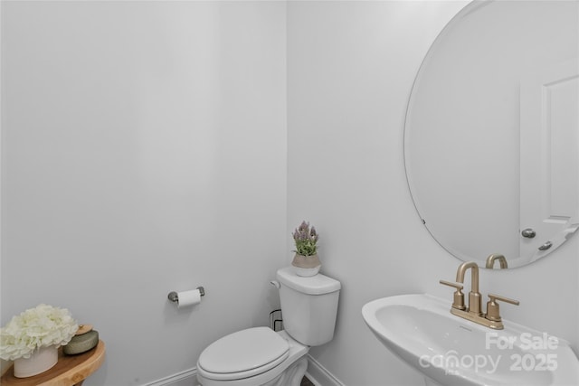 184 Cherry Springs Ln Unit 1-B, Asheville, NC 28804 - half bath featuring a sink and baseboards