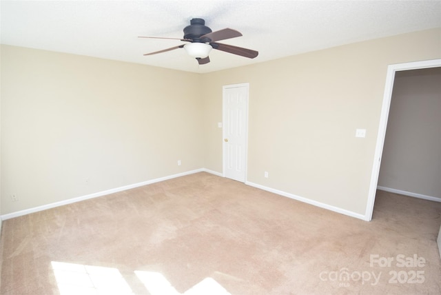 4704 Beech Crest Pl, Charlotte, NC 28269 - empty room featuring baseboards, light carpet, and a ceiling fan