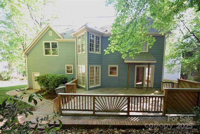 4704 Beech Crest Pl, Charlotte, NC 28269 - rear view of house featuring a deck and a shingled roof