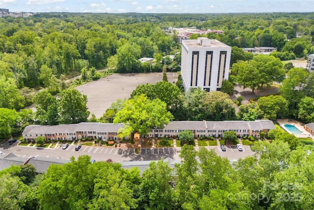 4605 Hedgemore Dr Unit I, Charlotte, NC 28209 - bird's eye view featuring a view of trees