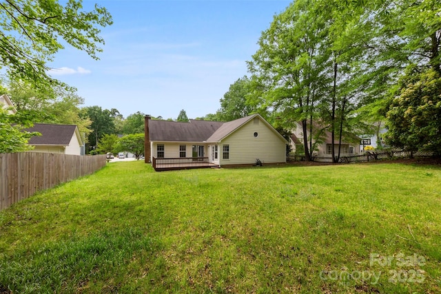 13324 Kintyre Ct, Matthews, NC 28105 - rear view of house featuring a wooden deck and a chimney