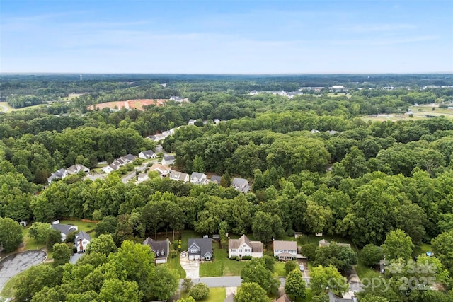 13324 Kintyre Ct, Matthews, NC 28105 - aerial perspective of suburban area with a heavily wooded area