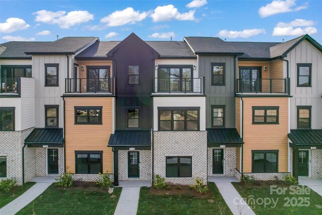 714 Falling Oak Aly Unit 18, Huntersville, NC 28078 - multi unit property featuring brick siding, a standing seam roof, and metal roof