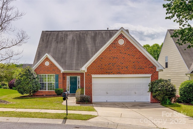 view of front of home with a front yard, brick siding, driveway, and an attached garage