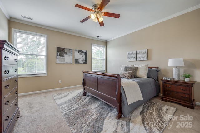 bedroom with carpet, a ceiling fan, visible vents, ornamental molding, and baseboards