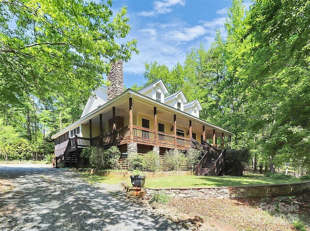 729 Lochaven Rd, Waxhaw, NC 28173 - country-style home with stairs, covered porch, and a chimney