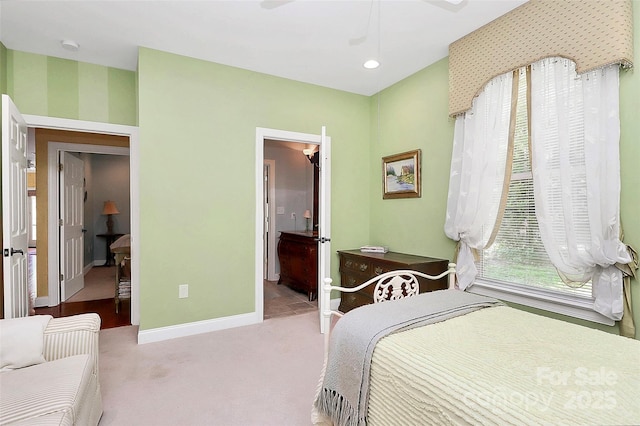 729 Lochaven Rd, Waxhaw, NC 28173 - bedroom featuring baseboards, carpet flooring, wallpapered walls, connected bathroom, and ceiling fan