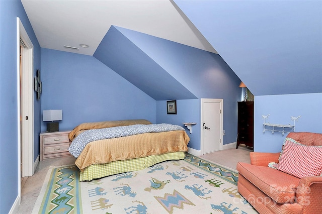 729 Lochaven Rd, Waxhaw, NC 28173 - bedroom with light carpet, vaulted ceiling, and baseboards