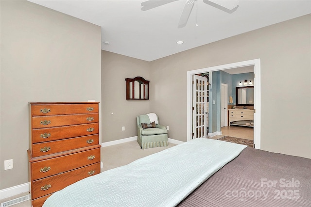 729 Lochaven Rd, Waxhaw, NC 28173 - bedroom featuring light carpet, baseboards, ensuite bathroom, and ceiling fan